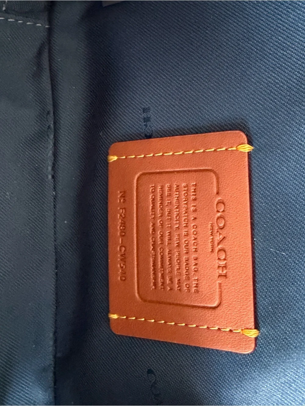 Coach Navy Fabric Interior with Tan Leather Creed Patch